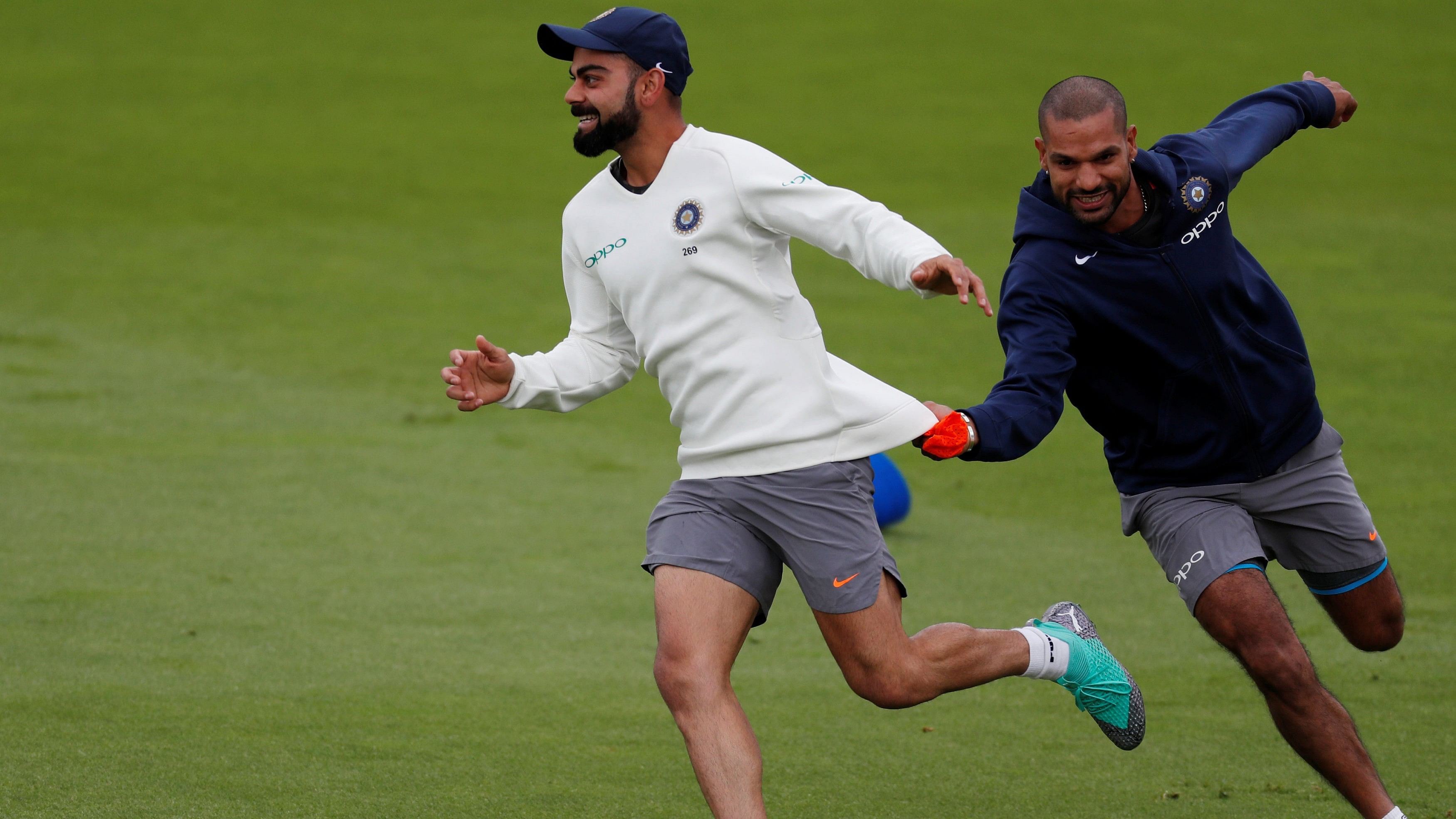 <div class="paragraphs"><p>Shikhar Dhawan and Virat Kohli during nets action</p></div>